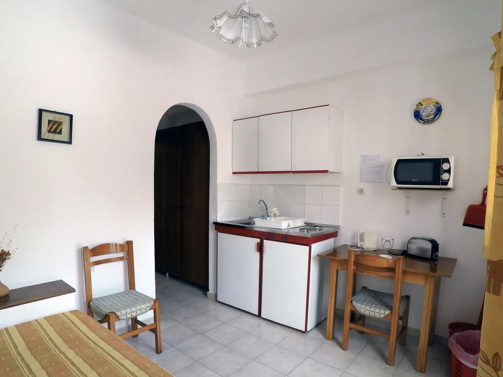 Milos Apartments Eloúnda Quarto foto